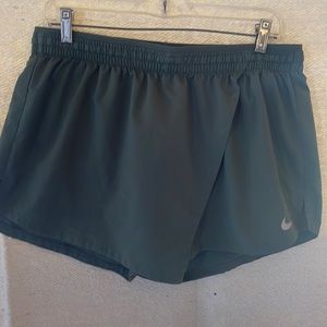 Nike skort with liner and zipper key pocket.